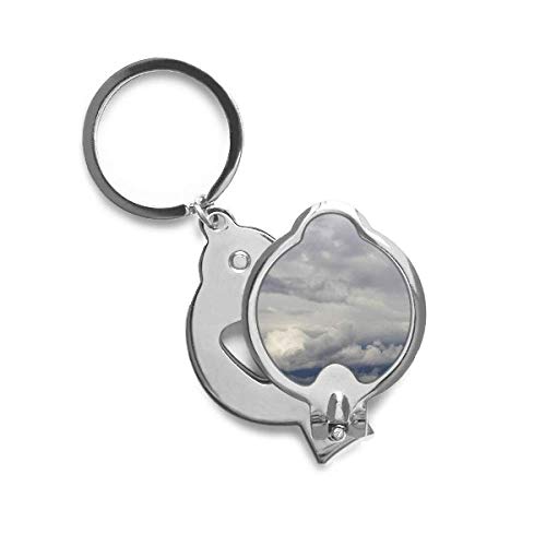 Coupe-ongles Nuages Sombres et Vent accessoire de manucure design ciel