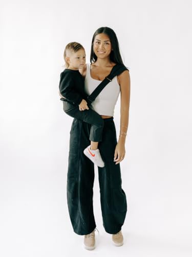 Tushbaby Liftoff Toddler Sling - Minimalist, Easy-On Toddler Carrier for Quick Carrying – Compact, Comfortable, and Stylish with Built-in Phone Pocket & Bottle Holder (Black)