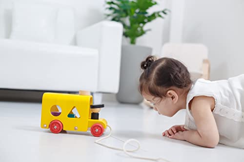 Image of PlanToys Sorting Bus Pull Toy - Sustainably Made from Rubberwood Featuring Organic-Pigment Coloring and Water-Based Dyes with 3 Colorful Shapes and Pull-Along Bus