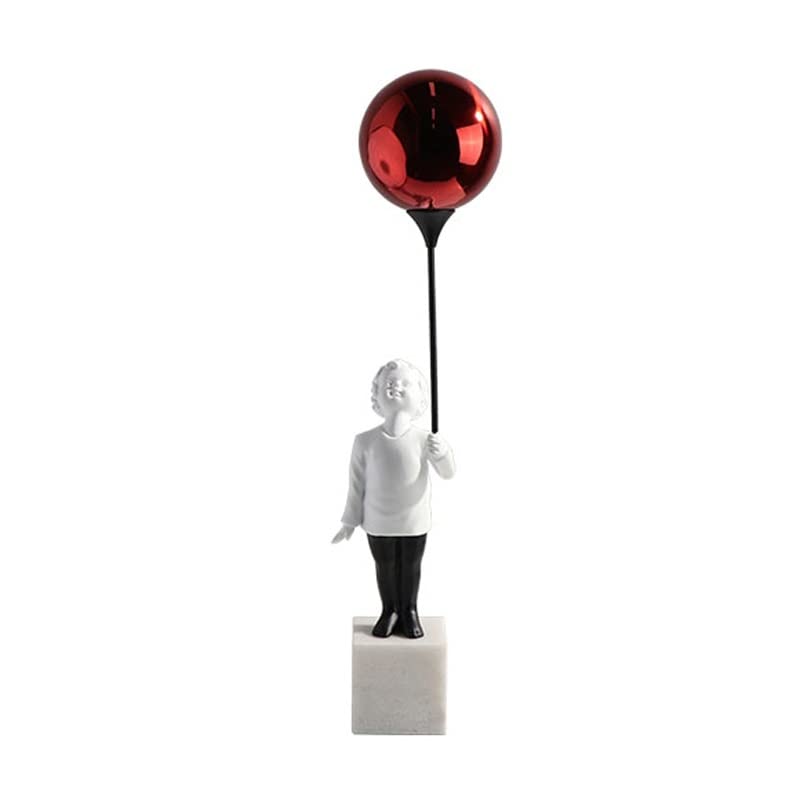 Sculpture petit garçon au ballon : l'élégance d'une décoration artistique haut de gamme