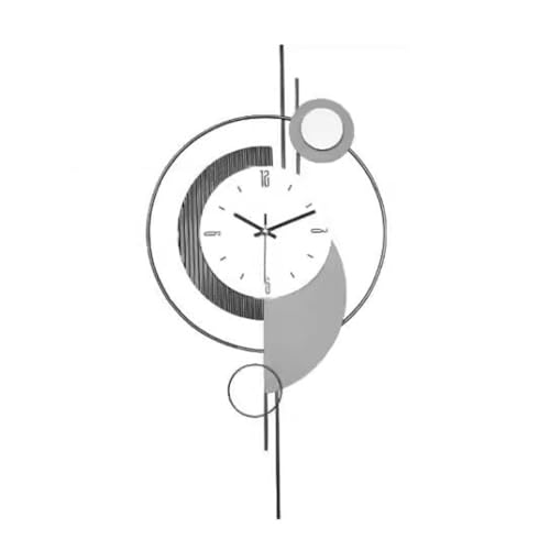 Horloge suspendue d'art mural pour rompre la monotonie d'un mur vide