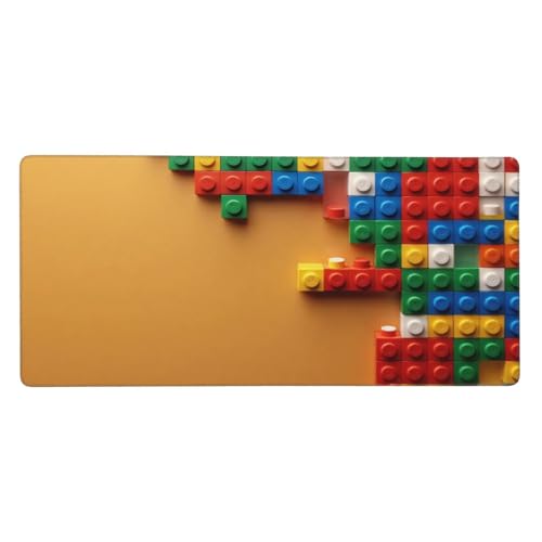 Bords cousus et base en caoutchouc pour ce grand tapis de souris de jeu au bloc coloré
