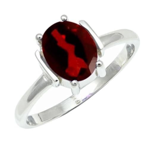 Bague en argent sterling et grenat faite main, un bijou artisanal d'exception