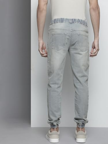 Image of The Indian Garage Co Men Slim Fit Solid Mid-Rise Stretchable Denim Joggers