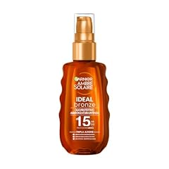 Garnier Olio Protettivo Abbronzante Spray, Protezione Media SPF 15+, Abbronzatura Dorata e Intensa, Pelle Protetta e Baciata dal Sole, Resistente all'Acqua, Ambre Solaire, Ideal Bronze, 150 ml