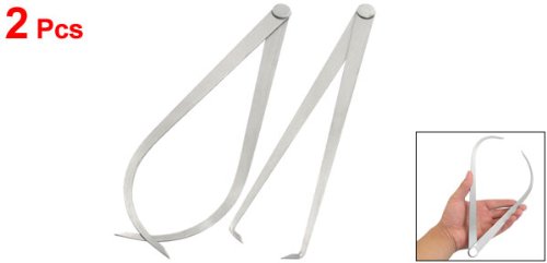 A hand holding an outside caliper, demonstrating how it would be used to measure an external dimension.