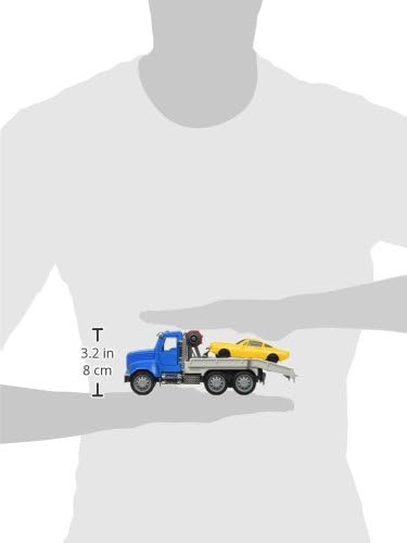 Image showing the tow truck toy held in a hand for size comparison