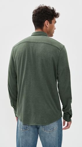 A Faherty Men's Coastline Knit Shirt draped over a chair, highlighting its casual elegance.