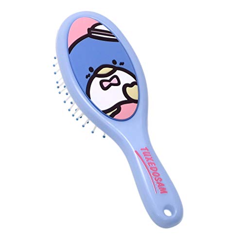 Tuxedo Sam brosse à cheveux nomade idéale pour votre routine beauté du matin