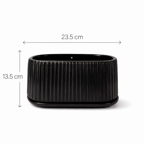 Image of Xtore Sculpted Ribbed Oval Planter with Drain Tray for Indoor & Outdoor Decor | Modern Minimal Flower Pot (Black, 23.5 cm) (Planter only)