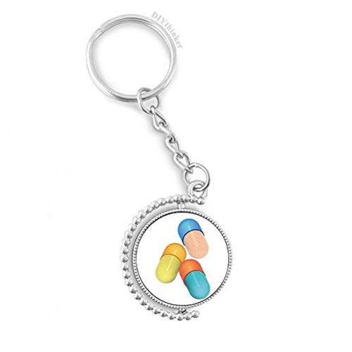 Llavero pastillero para viajes Pilgrim Anillo con cápsula rotativa
