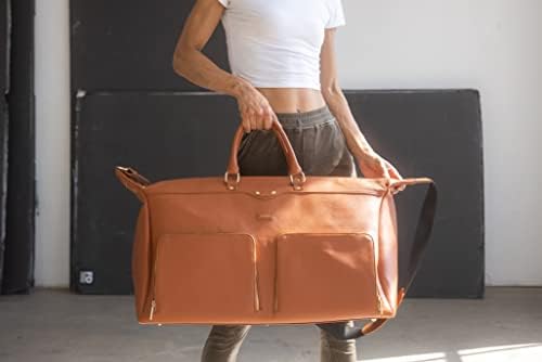 Packs Travel - Kingman Weekender Bag for Women and Men - Large Overnight Travel Tote, Carry On Luggage - 100% Full Grain Vegan Leather, Metal Zippers, Shoulder Strap - TSA and Airline Approved (Brown) 5 Packs Travel - Kingman Weekender Bag for Women and Men - Large Overnight Travel Tote, Carry On Luggage - 100% Full Grain Vegan Leather, Metal Zippers, Shoulder Strap - TSA and Airline Approved (Brown)