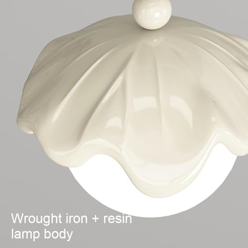 Modes en 3 couleurs pour cette suspension globe au style moderne