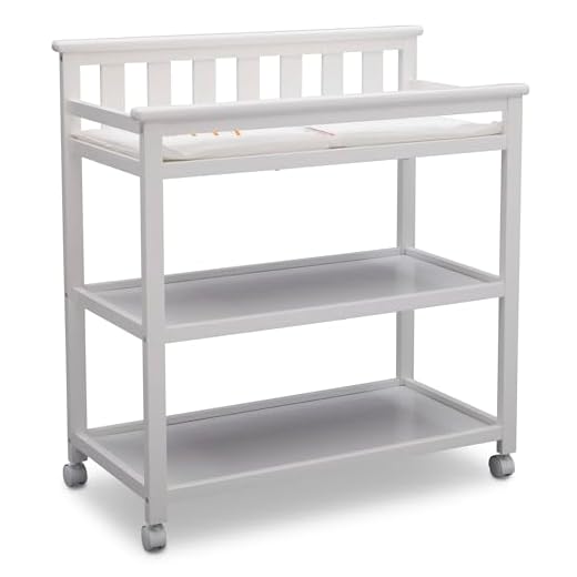 Delta Children Flat Top Changing Table with Wheels and Changing Pad, Bianca White