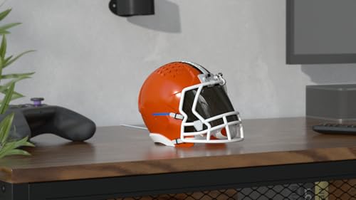 Image of NFL Echo Dot Bundle: Includes Echo Dot | Charcoal and Limited-Edition NFL Helmet Stand | Cleveland Browns. Available in All 32 NFL Team Designs. While supplies last.