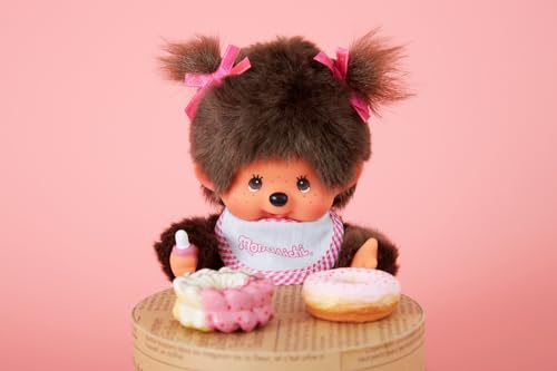 Sekiguchi 255550 - Original Monchhichi Mädchen, Plüschtier mit weiß-pinkem Lätzchen und Zöpfen mit Schleifen, ca. 20 cm großes Kuscheltier aus braunem Plüsch