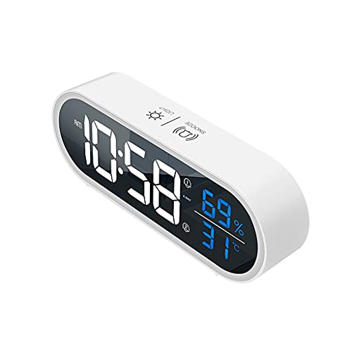 Il piccolo orologio ha una luce incorporata, che illumina una luce soffusa quando viene posizionato in condizioni di scarsa illuminazione per facilitare la lettura dell'ora.