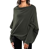 Conçue avec des manches chauve-souris amples qui tombent avec élégance et offrent une grande liberté de mouvement, cette coupe oversize flatte toutes les silhouettes et apporte une touche de féminité douce à vos tenues décontractées.
