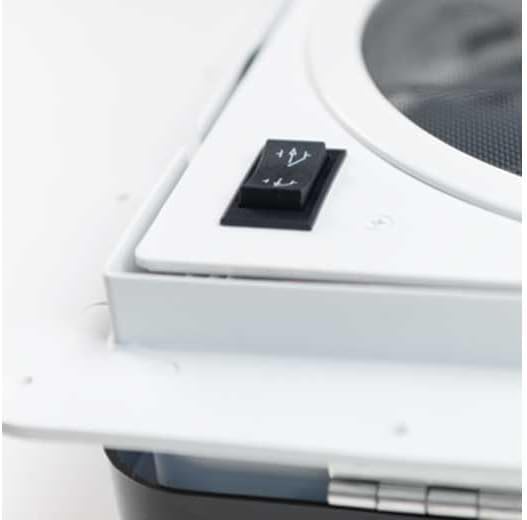 Close-up view of the fan speed and direction control switch.