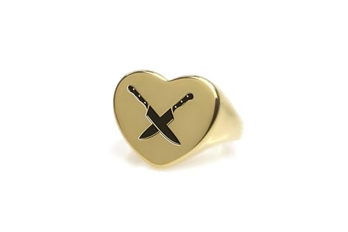Bague en forme de cœur et couteau en or pour le quotidien d'un chef