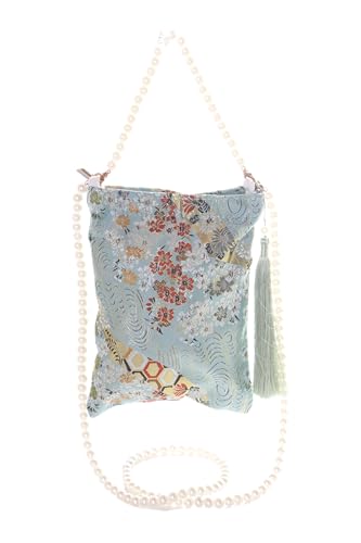Sac en tissu brodé turquoise parfait pour un mariage ou une soirée