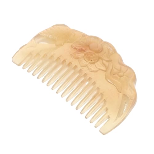 Peigne en corne naturelle sculpté main, le soin artisanal d'exception