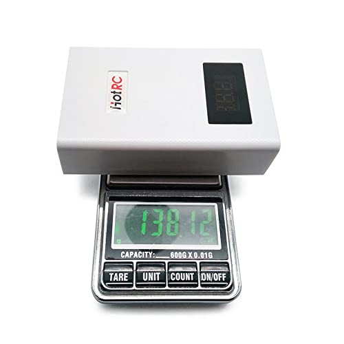 The HOTRC A400 charger placed on a digital scale, showing its weight of approximately 138 grams, emphasizing its lightweight design.