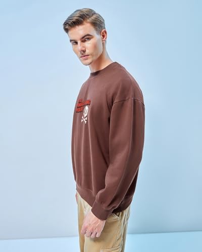 Image of Bewakoof Men's Graphic Printed Oversized Fit Full Sleeve Round Neck Fleece Sweatshirt