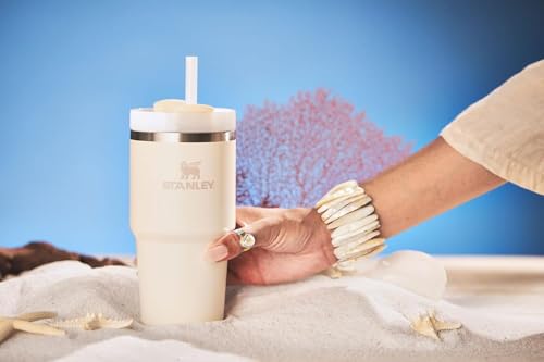 Image of STANLEY Quencher H2.0 Tumbler with Straw 20 oz | Flowstate 3-Position Lid | Cup Holder Compatible for Travel | Insulated Stainless Steel Cup | BPA-Free | Cream