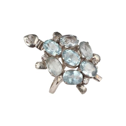 Bague tortue en argent 925 et topaze bleue naturelle sertie main