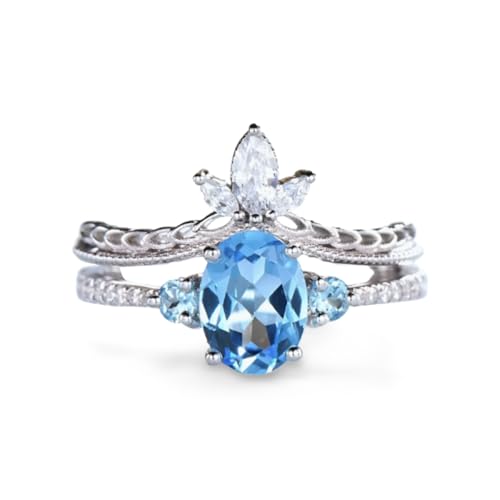Bijoux de fête pour femmes et hommes avec anneaux argentés fleur et pierre bleue ronde