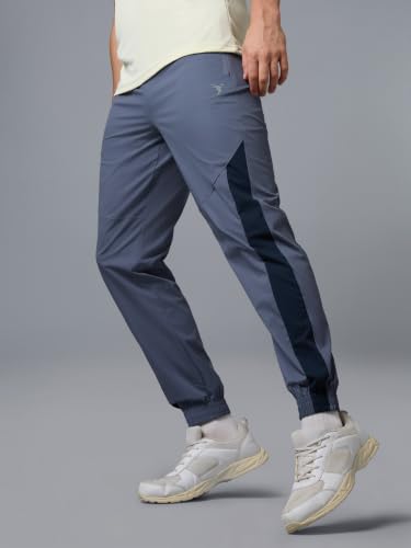 Image of TECHNOSPORT Men's Regular Fit Joggers with Zip Pockets, TECHNOLITE Quick Dry Stretchable Lightweight Track Pants for Gym Running and Casual Wear