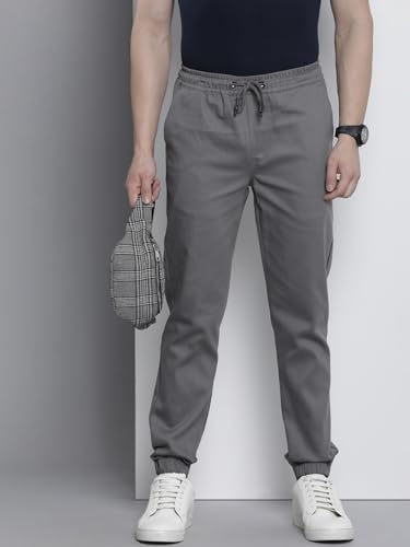 Image of The Indian Garage Co Men Slim Fit Solid Mid-Rise Stretchable Chino Joggers