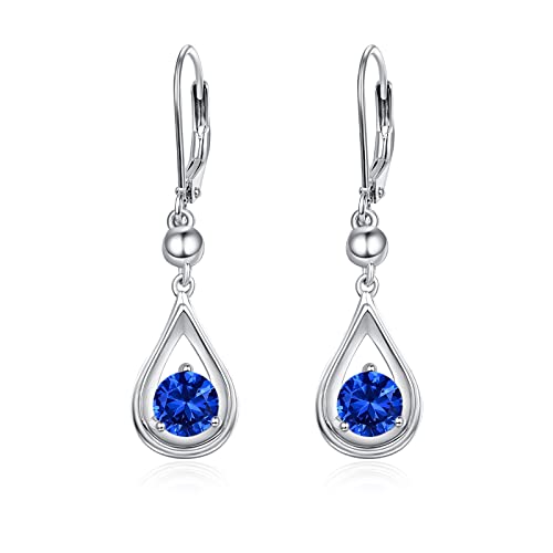 Pendientes colgantes de plata para iluminar tu look de oficina y eventos de noche