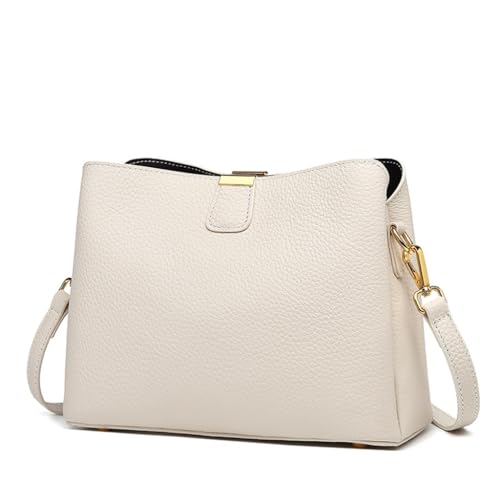 Sac à bandoulière en cuir pour femme cherchant un rangement compact et chic