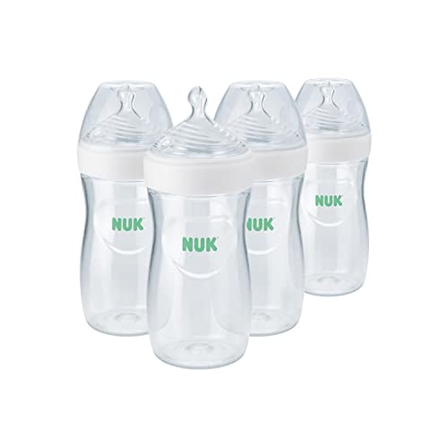 Image of NUK Simply Natural Baby Bottle with SafeTemp, Anti-Colic Vent, and Slow Flow Nipple for Natural Feeding, 9 oz., 4-Pack