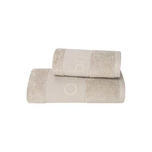 Raffinato ed essenziale, questo set in morbida spugna di cotone coccola la pelle con delicatezza. Include un asciugamano viso (50x90 cm) e uno ospite (30x50 cm), entrambi con fascia logata jacquard tono su tono.
