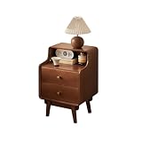 Migliora la tua camera da letto con questo comodino moderno in legno massello di metà secolo. Realizzato con impiallacciatura in noce ricco e bordi arrotondati, combina perfettamente stile e funzionalità. Ideale per riporre oggetti essenziali aggiungendo un tocco di raffinatezza all'arredamento della tua camera da letto. Perfetto per chi cerca una soluzione di arredamento elegante ma pratica.