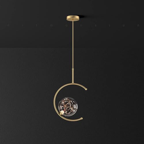 Lampe suspendue de chevet en cuivre pour une chambre cocooning
