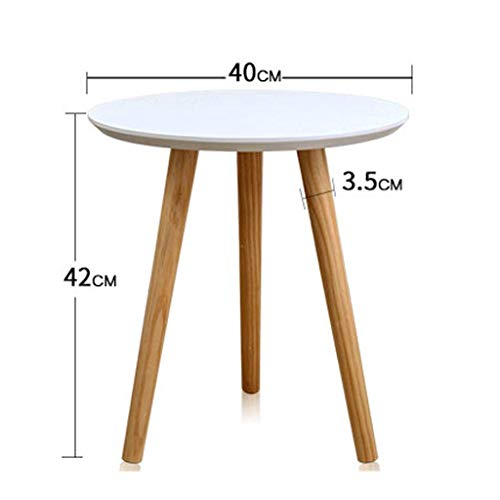 Table ronde bois massif compacte : la solution gain de place pour petit salon