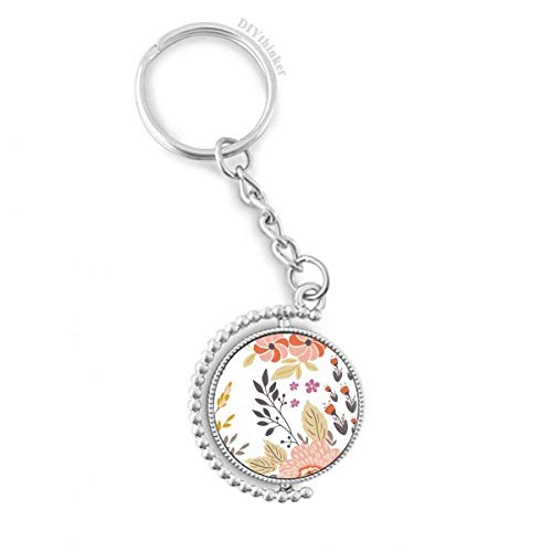 Llavero de flor blanca y amarilla para decorar tu bolso de diario
