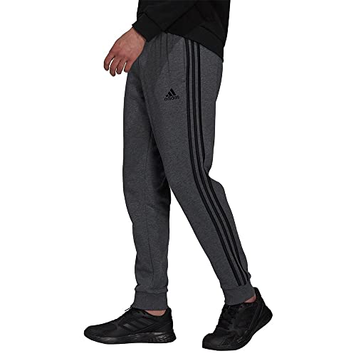 Image of adidas Men's Mid Rise Essentials Warm-Up Slim Tape 3-Stripes Tracksuit Bottoms
