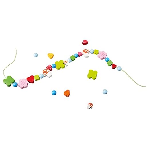 HABA 302636 - Fädelspiel Glücksbringer | Kreatives Fädelspielzeug mit Glücksbringer-Motiven | Set aus 2 Fädelschnüren, 30 Fädelelementen und 20 Perlen zum Auffädeln | Spielzeug ab 3 Jahren
