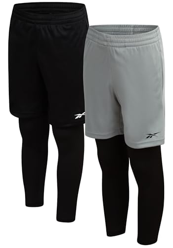 Opiniones de Pantalones cortos para Niño los 10 mejores. 41 Reebok - Pantalones cortos de baloncesto para niños, paquete de 2 en 1, pantalones cortos deportivos para correr, con bolsillos de compresión y cordón, Negro/Gris, 18-20
