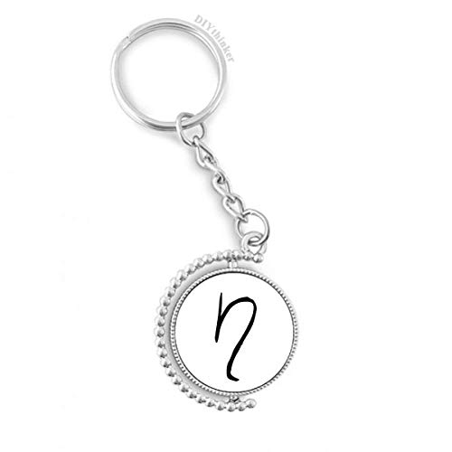Silhouette noire alphabet grec ETA sur un porte-clés rotatif chic