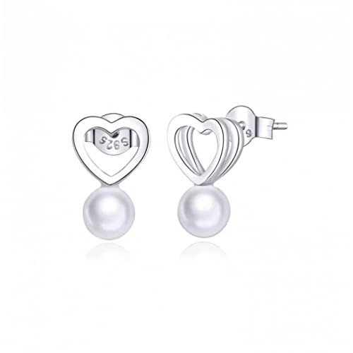 Boucles d'oreilles cœur argent et perles, le bijou idéal du quotidien au bureau