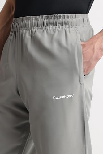 Image of Reebok Men's Woven Mesh Track Pants - Breathable Mesh Panels Gym Trackpants for Men | Training Running Payjama for Men | Athletic Pants - Elastic Drawcord Waistband