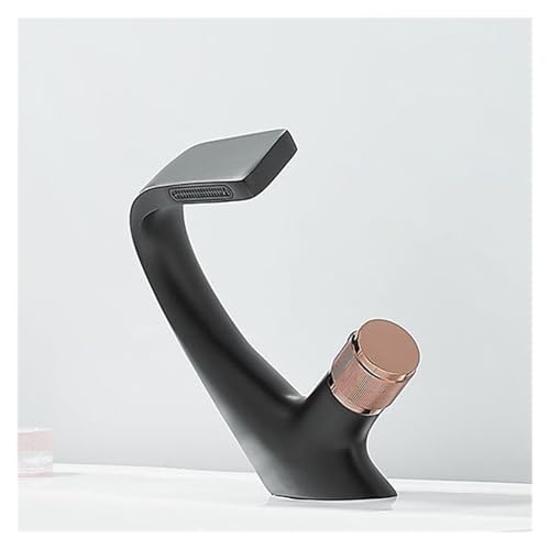Robinet de lavabo noir et or élégant pour une salle de bain moderne chic