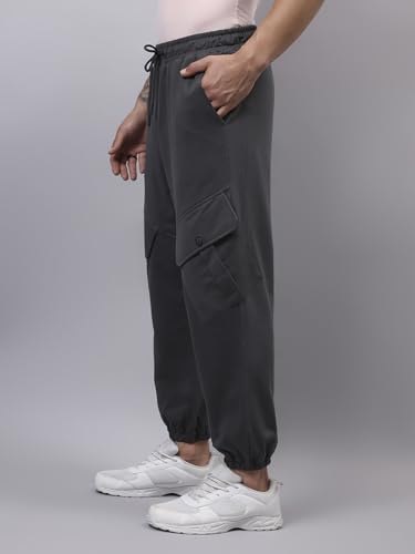 Image of Bewakoof Men's Cotton Super Loose Fit Joggers|Bewakoof Air 1.0 | Track pants for man | Lower for man | Trouser for men | Baggy trackpants for men | Multipurpose | Mens Lower Activewear | Utility Pockets | Lightweight & Flexible Elastic Waist | Casual Joggers | Loose Fit