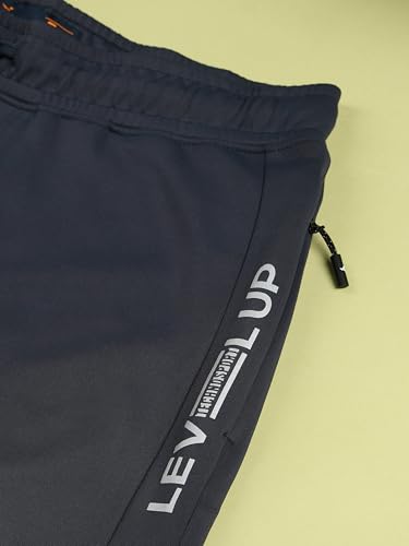 Image of TECHNOSPORT Mens Regular Fit Solid Woven Track Pant for Activewear, Regular Use and Quick Dry, (Non- Stretchable)